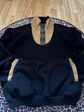 Black and brown quarter zip jumper with suede details